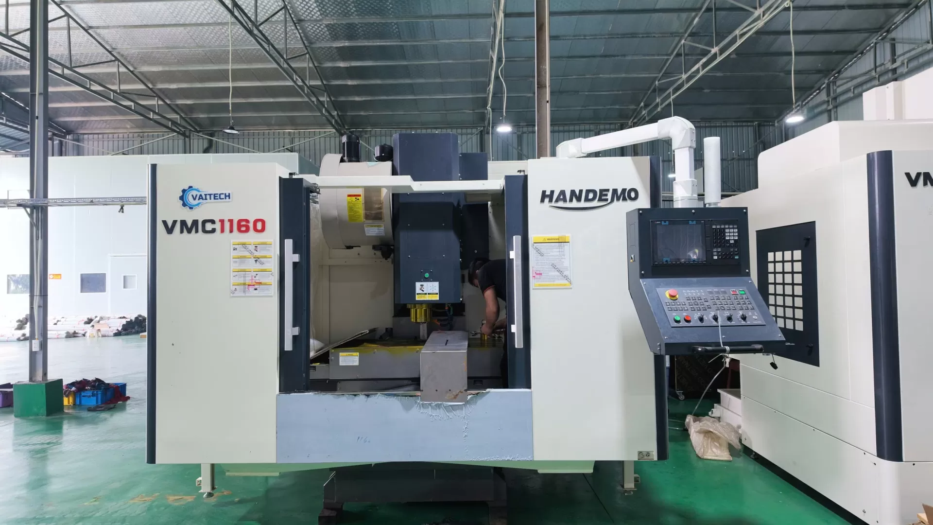 b&agrave;n giao m&aacute;y vmc 1160